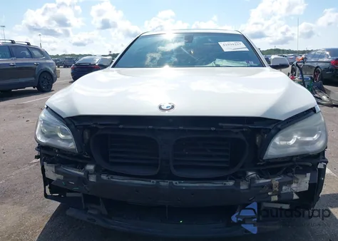 2014 BMW Alpina B7 из США, поврежденный, VIN WBAYE8C52ED135312